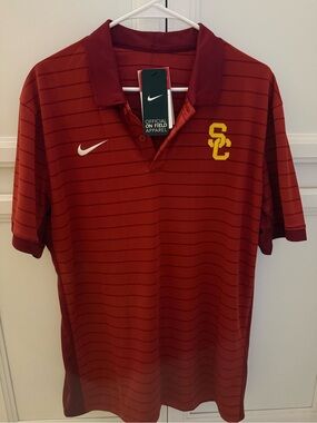 Brand new Nike Men’s USC Cardinal Polo with Yellow Logo